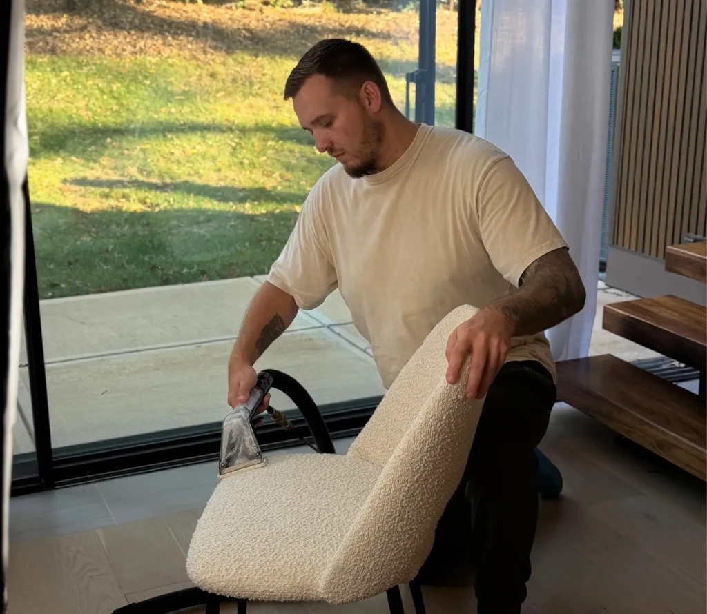 Professional chair cleaning removing stains and odors from upholstered seat
