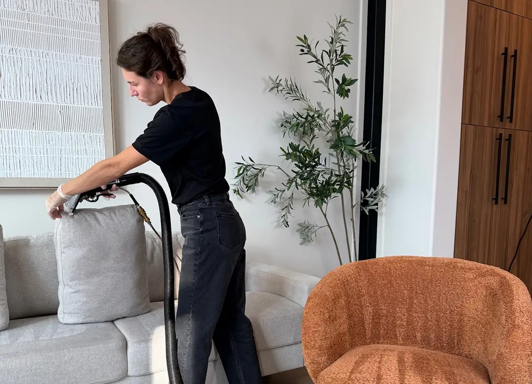 Professional Couch Cleaning In Dallas Technician Cleaning Sofa Cushions In Living Room