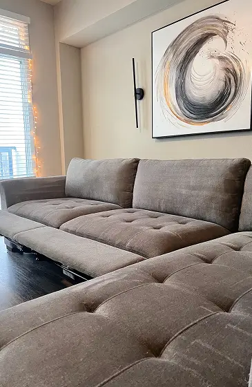 Sofa after professional cleaning in Dallas showing fresh and stain-free upholstery fabric