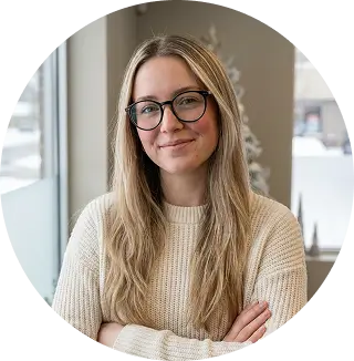 Smiling Dallas, Texas homeowner giving a testimonial after professional couch cleaning restored her sofa to a fresh and comfortable condition