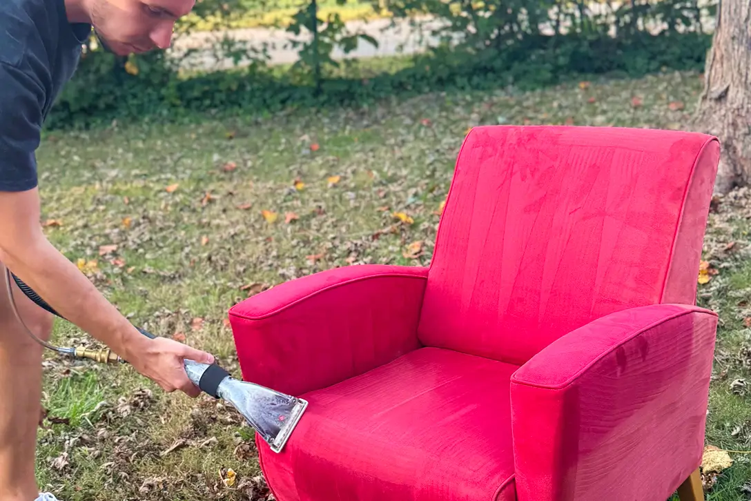 Professional patio furniture cleaning in Dallas removing dirt and stains from outdoor upholstery fabric