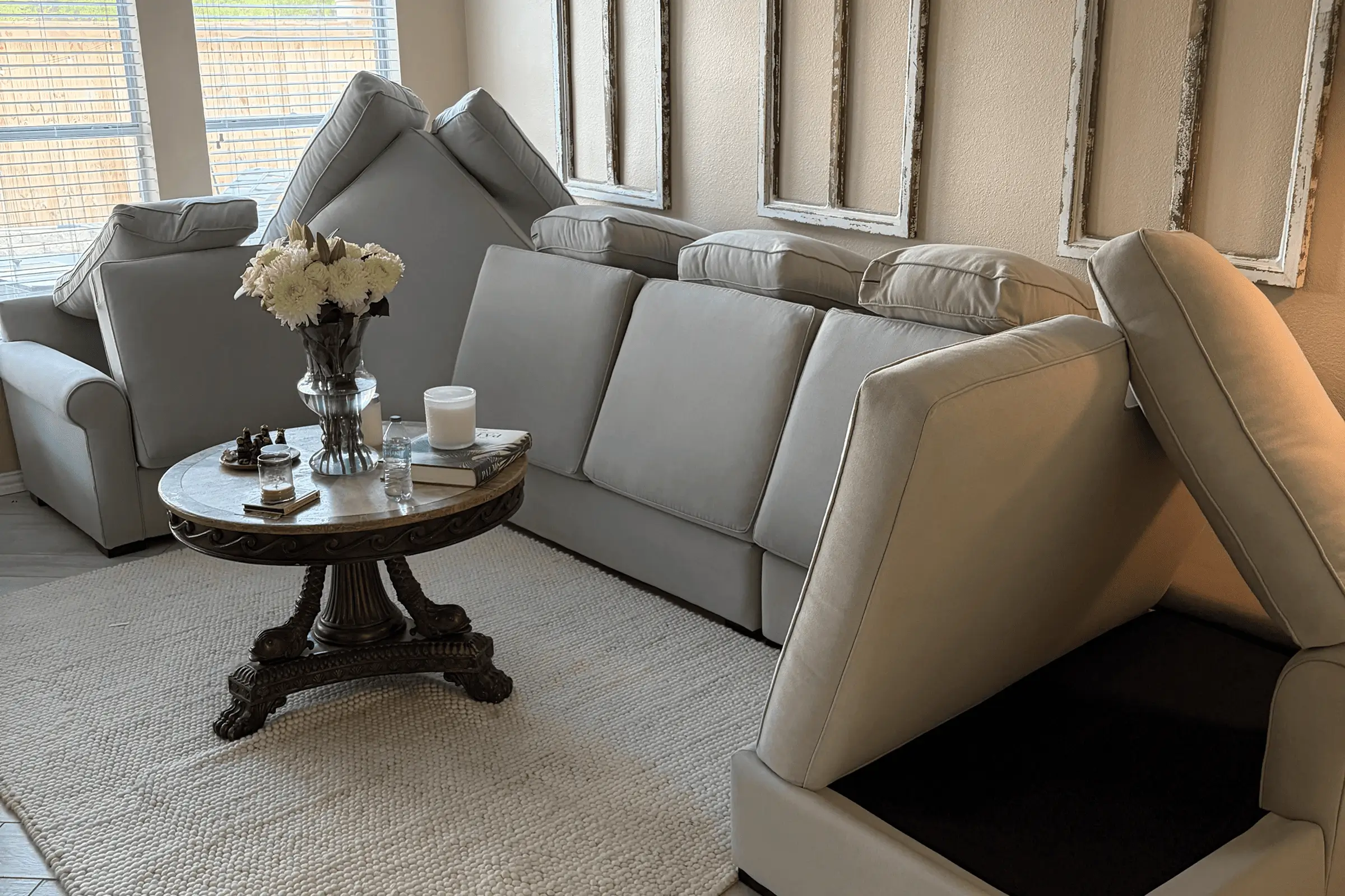 Light gray sectional sofa and armchair in a Charlotte, NC home prepared for professional upholstery cleaning service