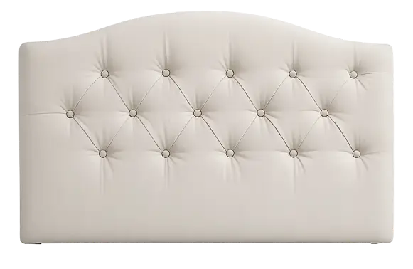Cream tufted upholstered headboard with an arched top