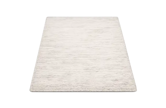 Soft cream wool area rug for rug cleaning services
